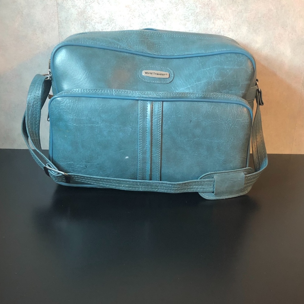 WORLD TRAVELER Blue marbled vinyl Carry on bag